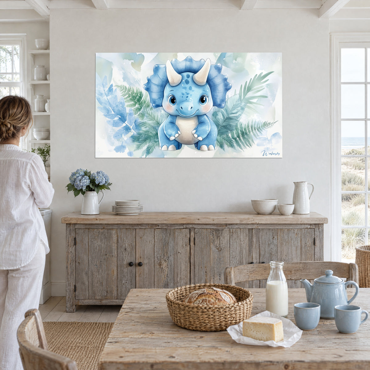 Wall art adorable blue prehistoric creature with rosy cheeks and white horns, mint green ferns, in a bright coastal home