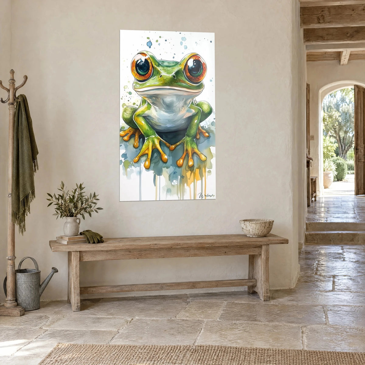 Wall art green tree frog in watercolour, yellow ochre fingers spread over slate-blue spots, three-quarter view in a stone hallway