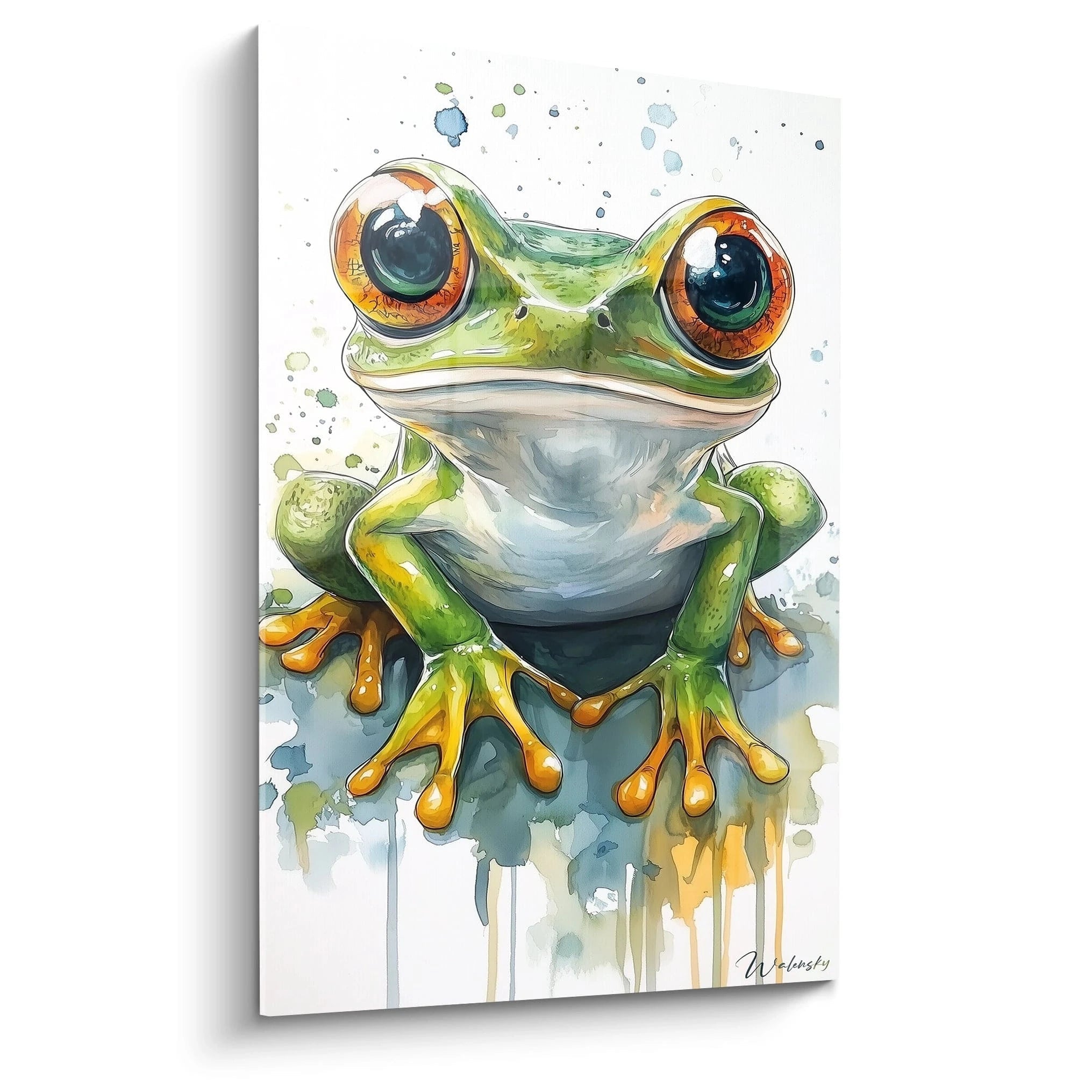 Un tableau enfant représentant une grenouille vue de face, avec des yeux orange vif et un corps vert. Le fond présente des éclaboussures de couleurs bleu et vert, créant des textures fluides et légères.

