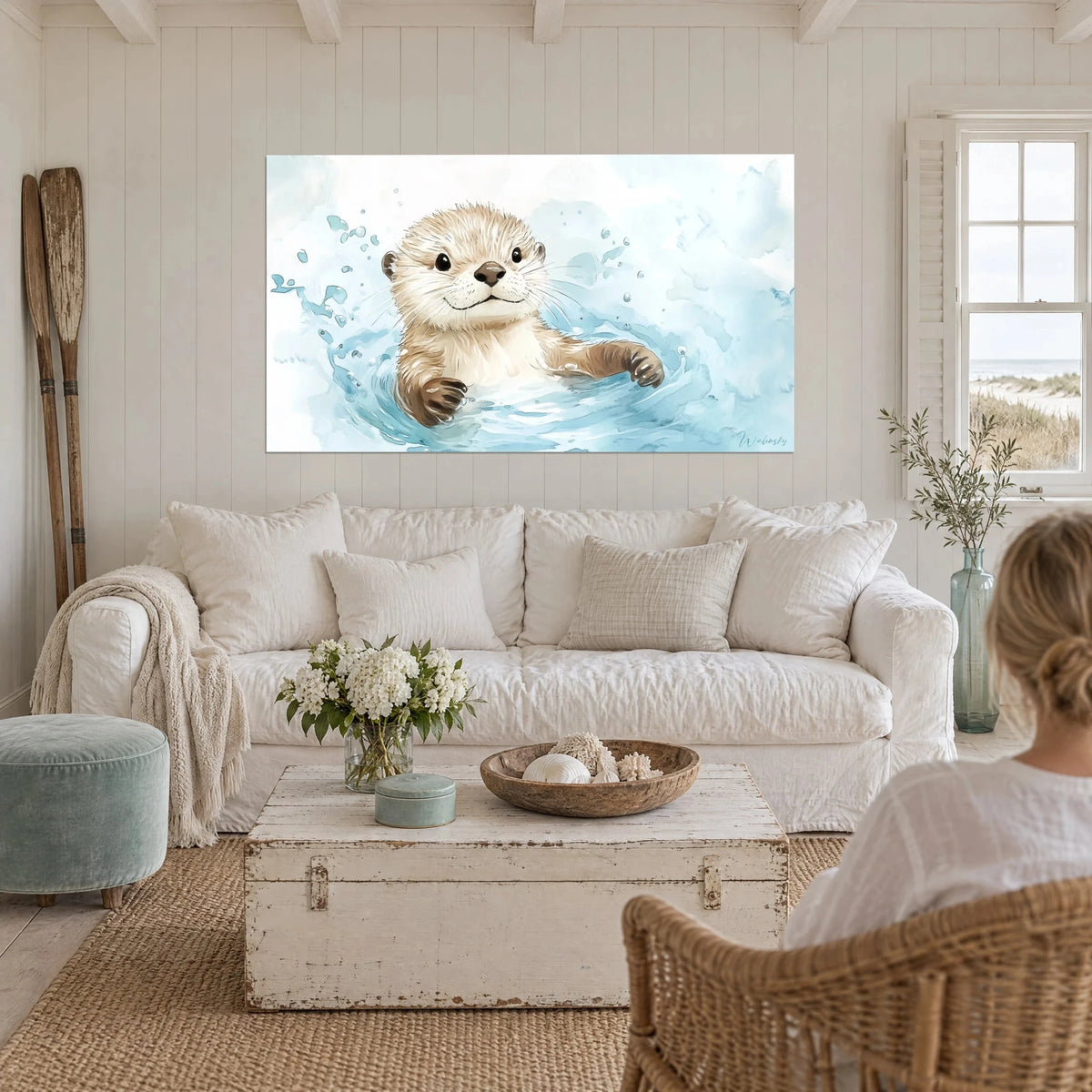 Wall art of a cream-furred otter swimming in glacier-blue water, brown paws, suspended droplets, above a sofa in a bright living room