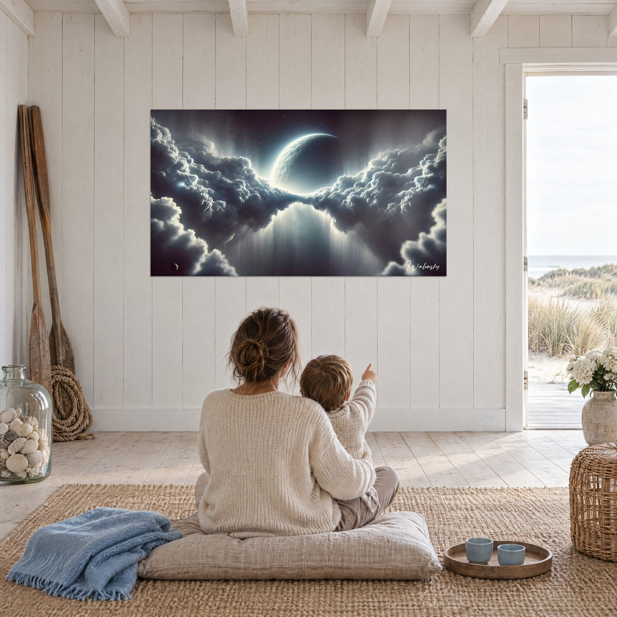 Wall art cosmic landscape of pearl grey clouds and an ivory crescent moon, mother and child seated facing the white wall