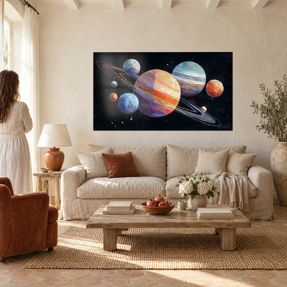Wall art solar system in thick impasto paint, orange planet streaked with violet on a black background, above a sofa in a bright living room