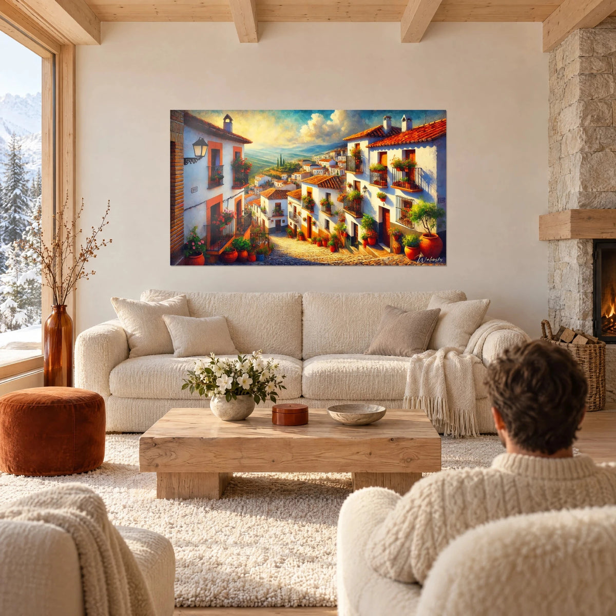Gemälde andalusisches Dorf mit weiß getünchten Fassaden, orangefarbenen Ziegeldächern und goldenem Himmel, über einem Sofa in einem hellen Wohnzimmer