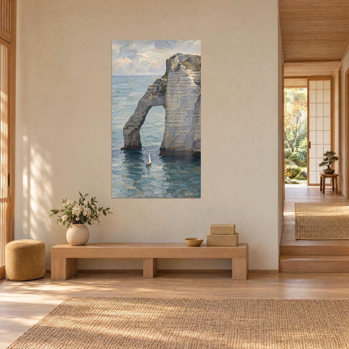 Wall art white cliff pierced by an arch above turquoise water, grey-blue sky, light wood bench, Japandi house in three-quarter view