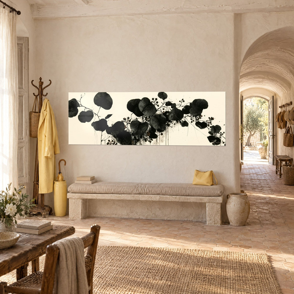 Wall art ink-drawn eucalyptus, charcoal speckled discs and drips on cream, hung above a stone bench in a Provençal farmhouse