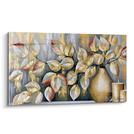 Branche d'eucalyptus dorée et argentée sur fond gris anthracite, feuilles texturées près d'un vase bronze