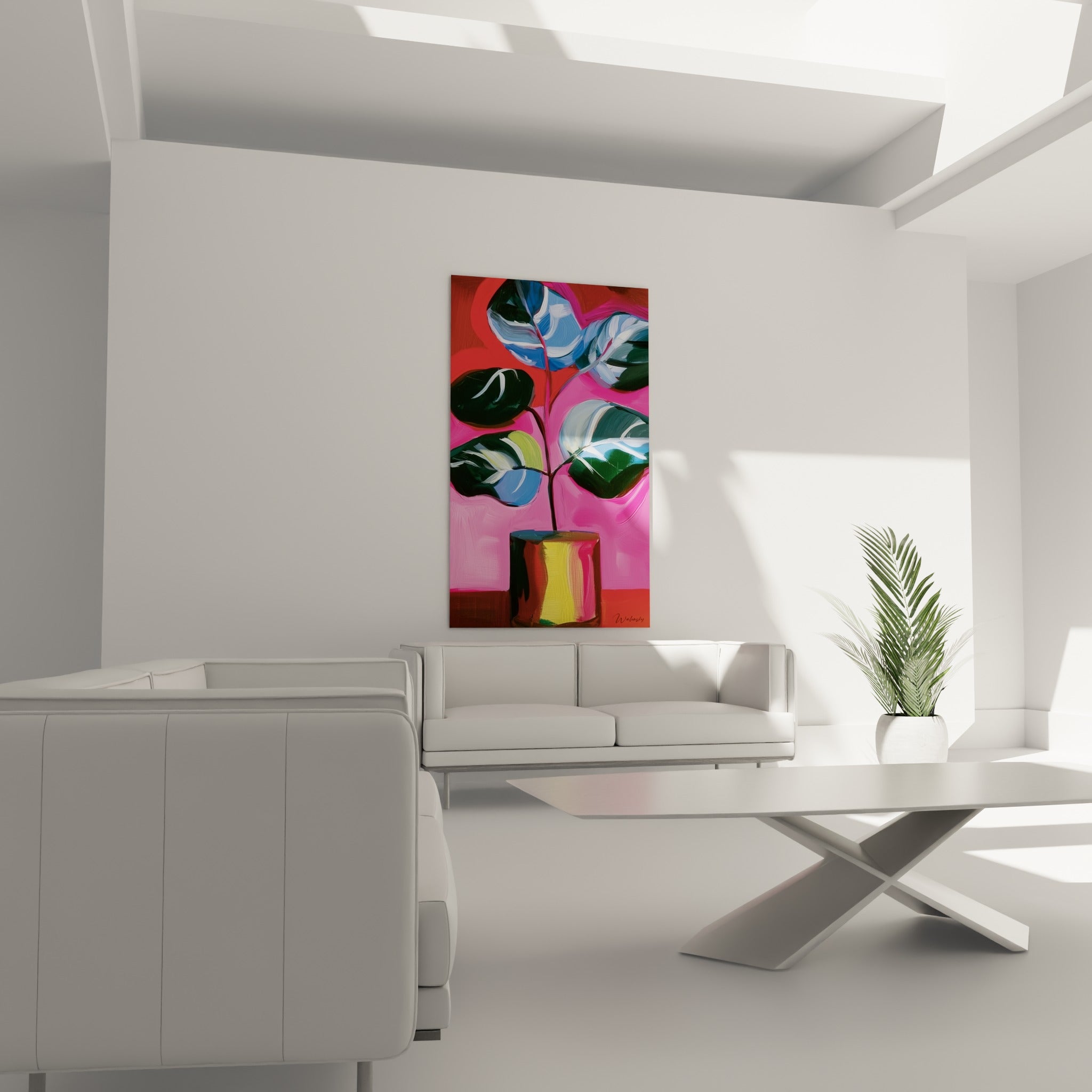 Composition végétale d'eucalyptus fuchsia et vert bouteille, placée au-dessus d'un canapé dans un salon lumineux