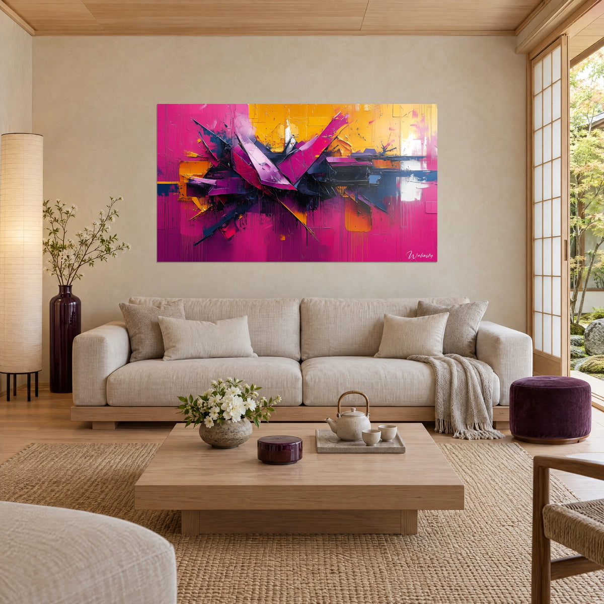 Wall art explosion of fuchsia and violet planes on ochre yellow background, black drips, hung above a sofa in a bright living room