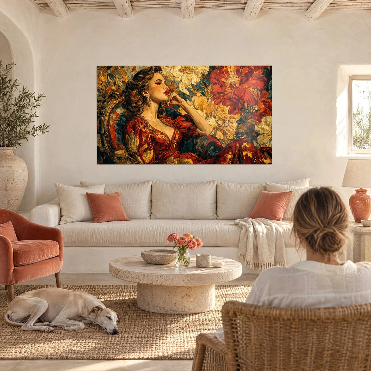 Wall art portrait of a woman with red lips, scarlet dress and ochre flowers, above a sofa in a bright living room
