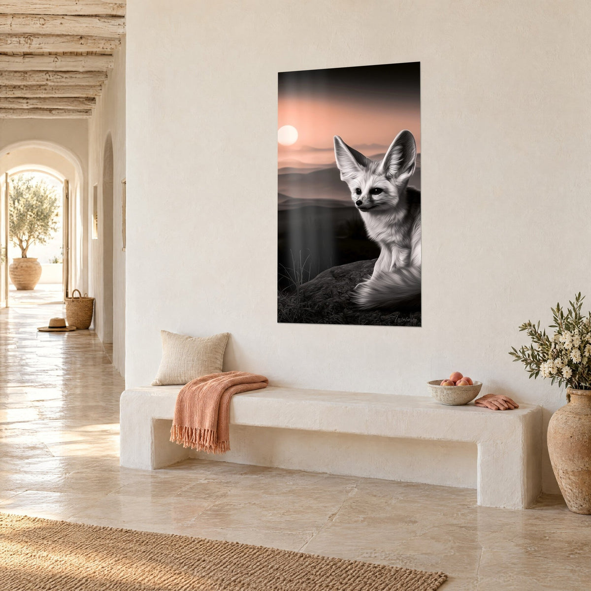 Wall art small desert canid in black and white, pale sun and pinkish hills, cream wall of a vaulted stone corridor