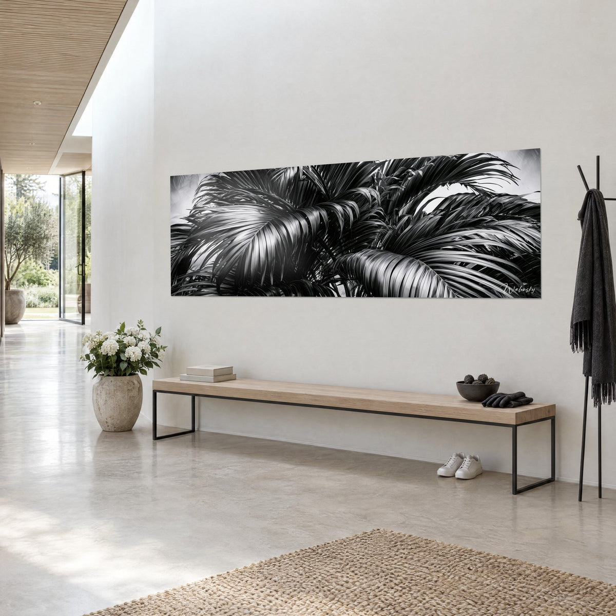 Wall art chiaroscuro jungle, black palm leaves with steel grey reflections, white wall and light wood bench