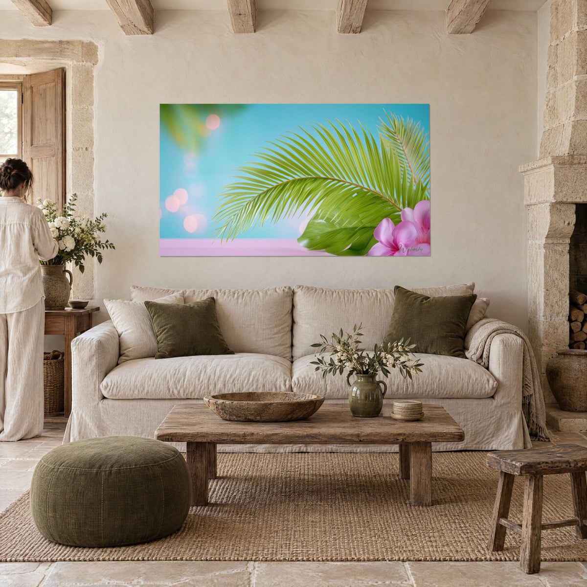 Wall art with a green arched palm frond against a turquoise sky, pink flower in the corner, light bubbles, above a sofa in a bright living room