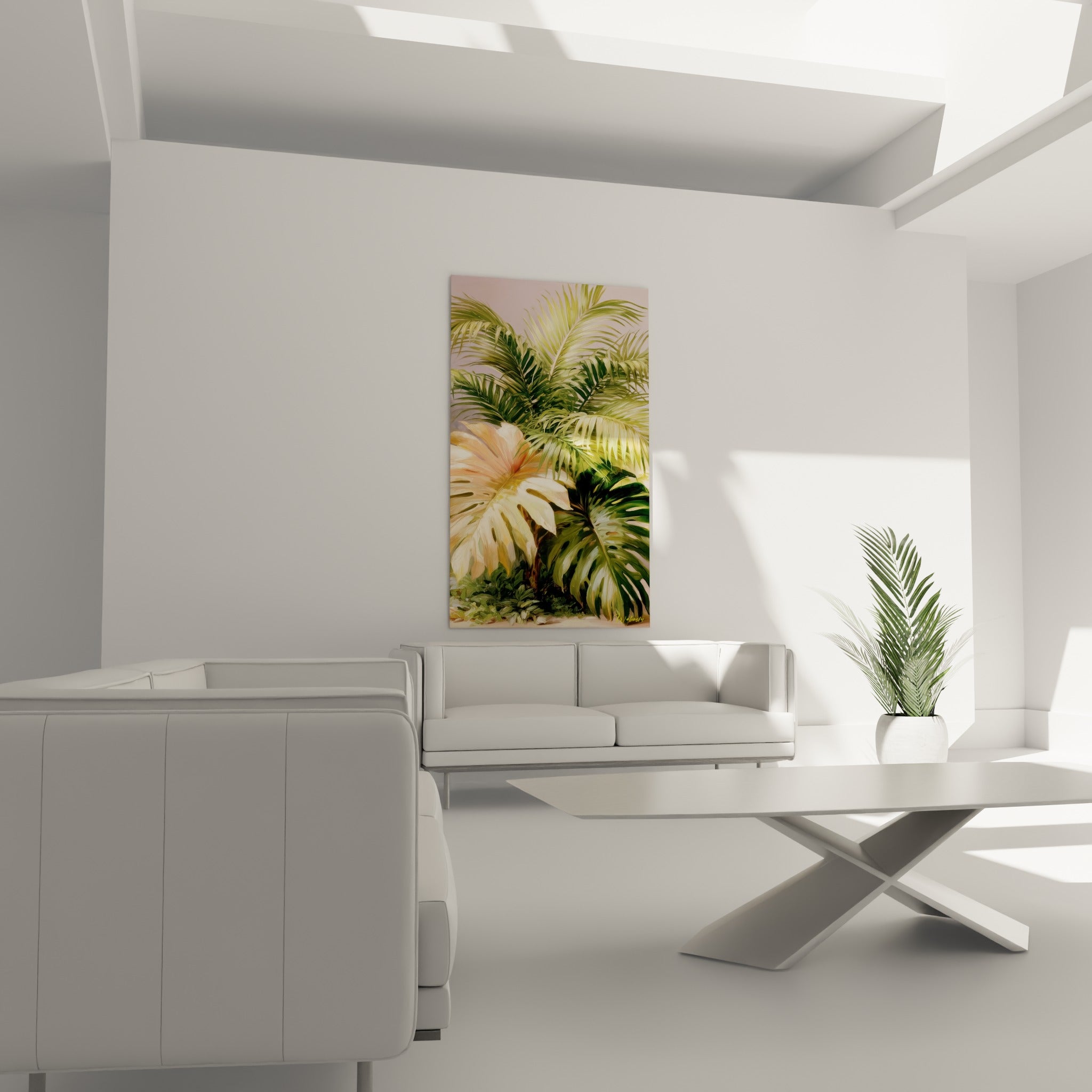 Feuillage tropical vert sauge et rosé au-dessus d'un canapé dans un salon lumineux
