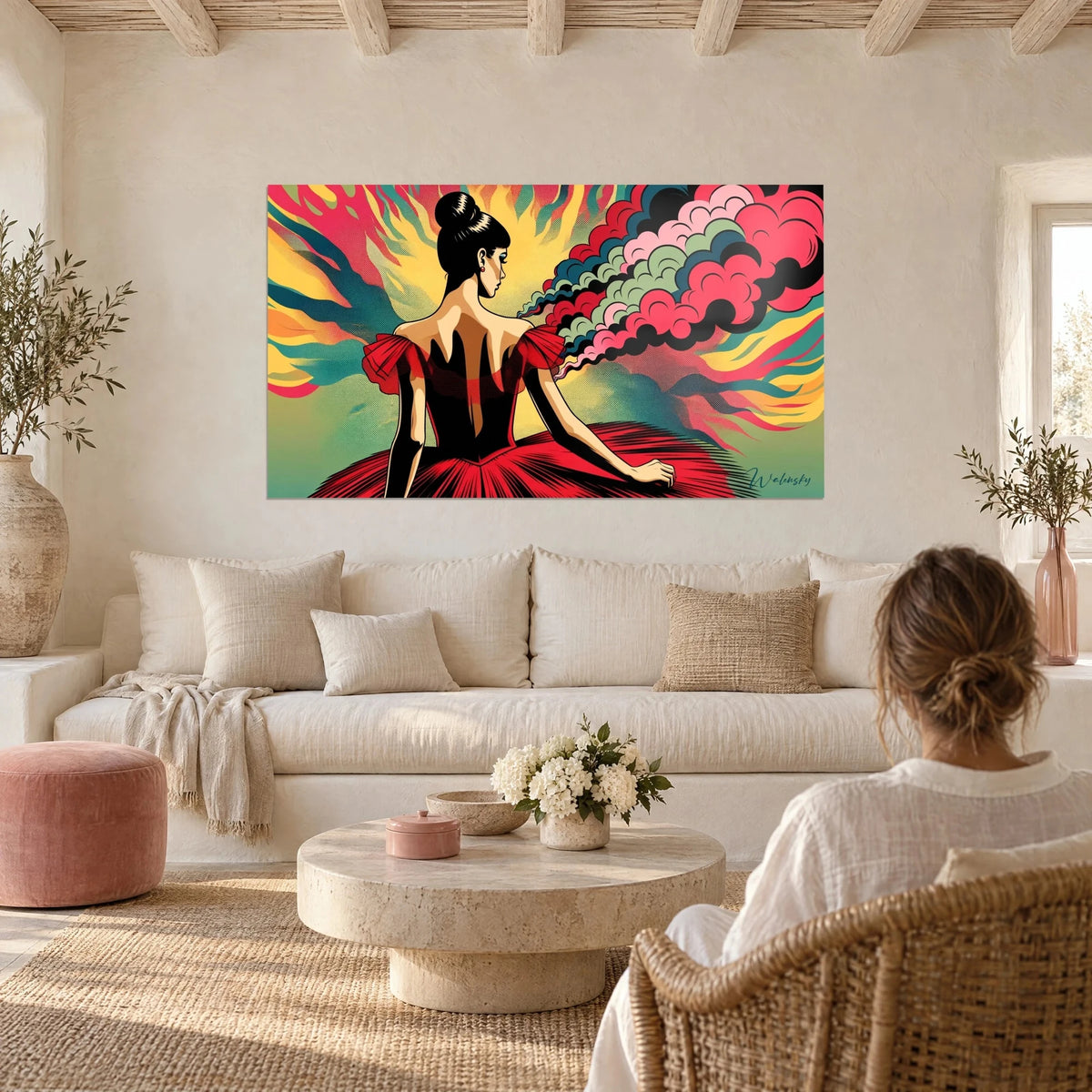 Wall art dancer seen from behind in a cherry-red tutu, black chignon, pink and green clouds on a yellow background, above a sofa in a bright living room