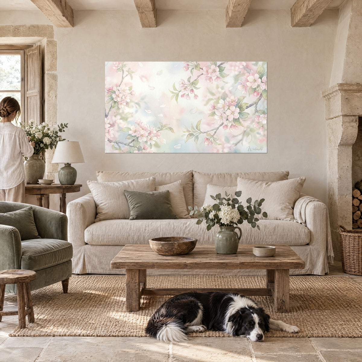 Quadro di fiori di melo rosa pallido e foglie verde salvia su sfondo ad acquerello, collie sdraiato, sopra un divano in un soggiorno luminoso