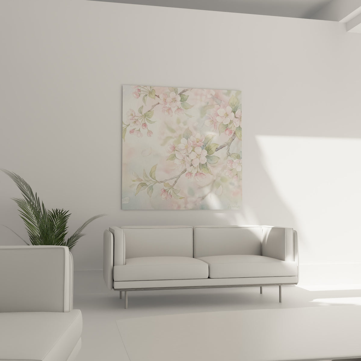 Bouquet de fleurs de cerisier rose et vert doux, au-dessus d'un canapé dans un salon lumineux