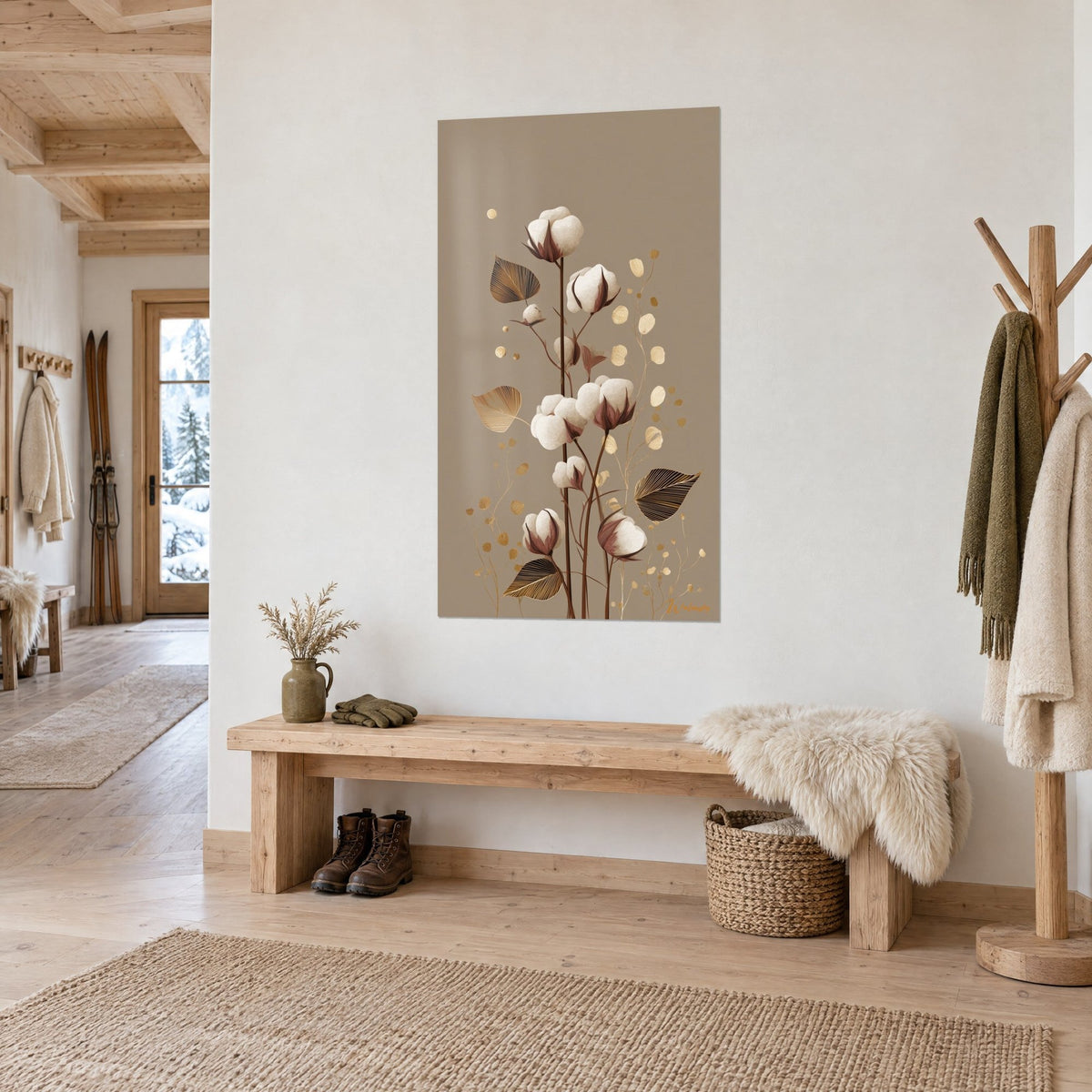 Quadro rami di cotone con batuffoli bianchi, steli marroni e foglie ocra dorate, parete bianca, panca in legno in una baita