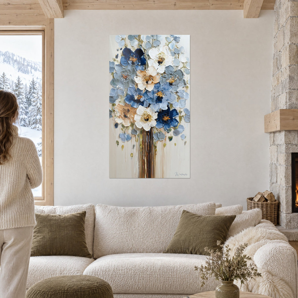 Wall art with a lush bouquet of impasto peonies in navy blue and cream white, golden hearts, above a sofa in a bright living room