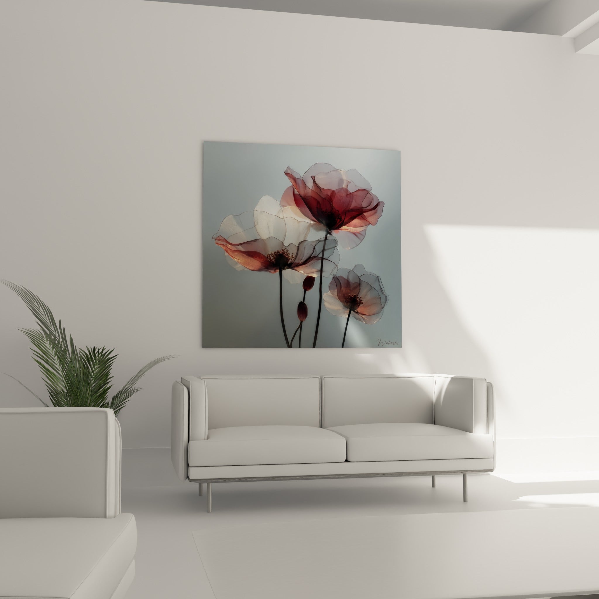 Pétales délicats bordeaux et gris perle disposés au-dessus d'un canapé dans un salon lumineux