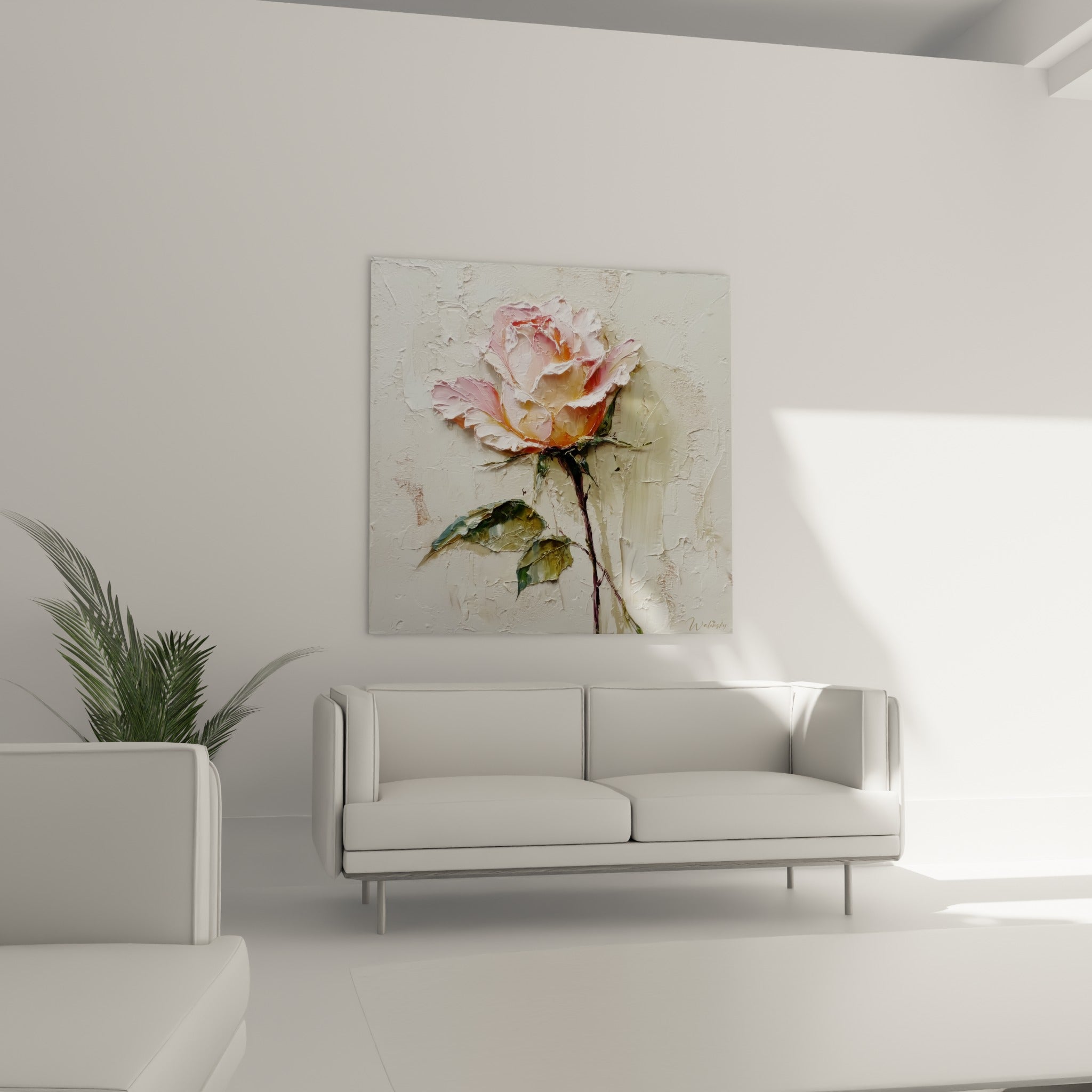 Pétales roses et blancs en volume, feuilles vert olive, suspendus au-dessus d'un canapé dans un salon lumineux