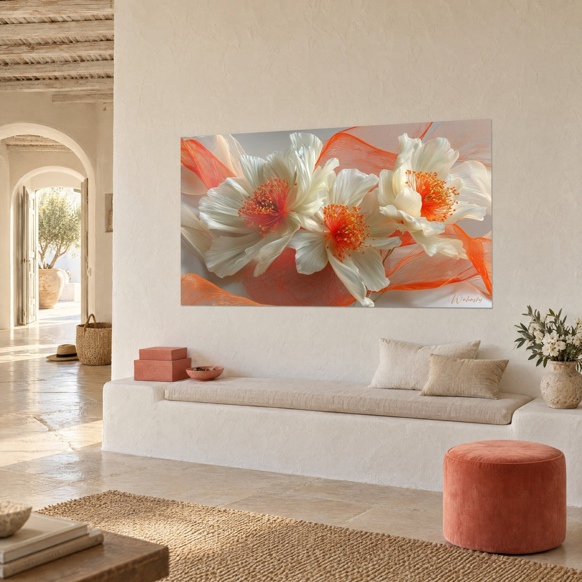 Wall art three ivory flowers with blazing orange centers, coral red thread ribbons, on a cream wall of a Mediterranean room