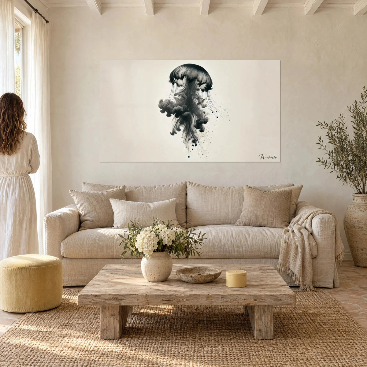 Wall art black ink jellyfish, ribbed umbrella and grey swirls on ivory background, above a sofa in a bright living room