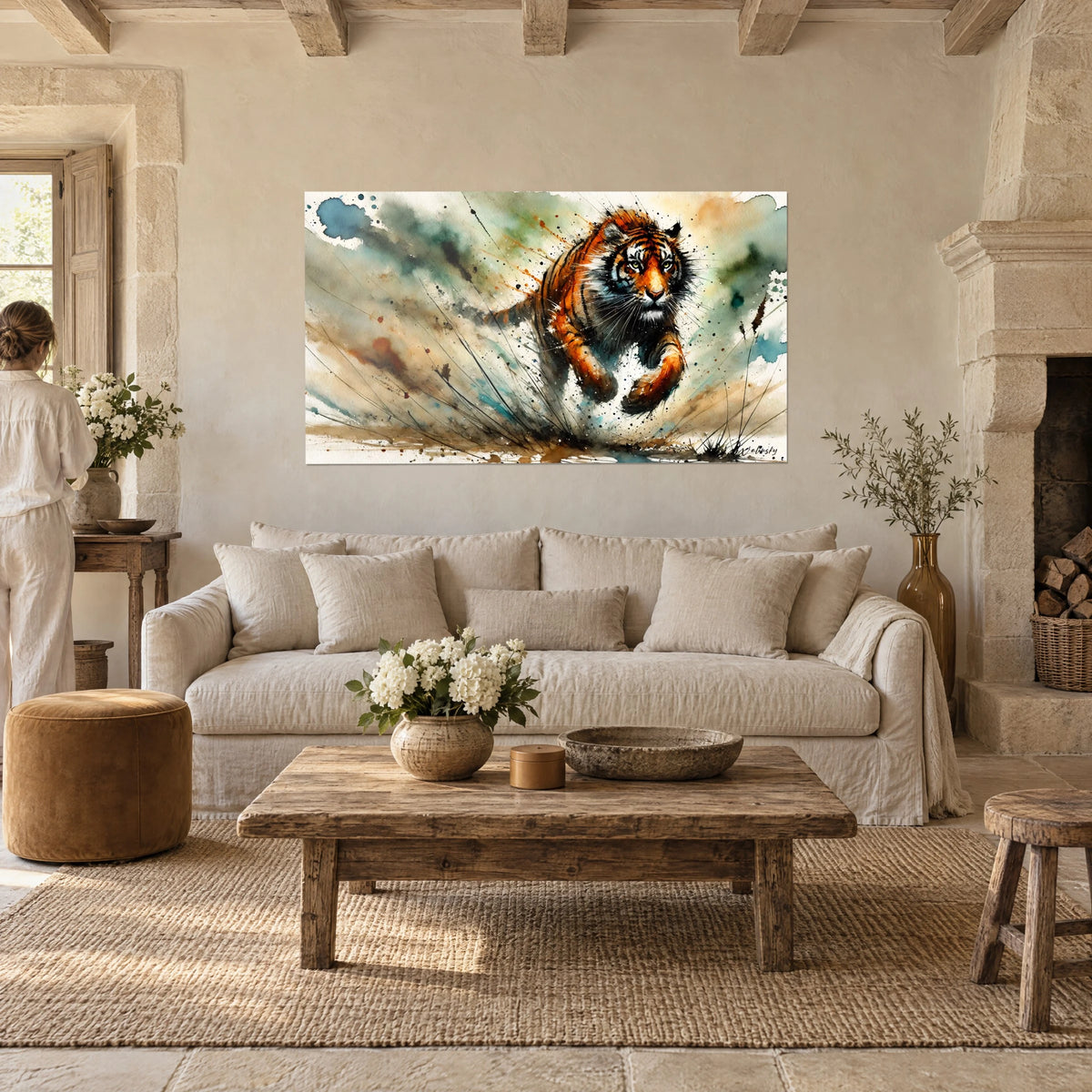 Wall art of a leaping tiger in orange and black watercolor, turquoise splashes, above a sofa in a bright living room