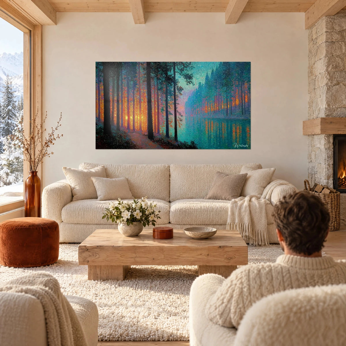 Tableau forêt féerique aux troncs sombres et lueur orange, lac turquoise, au-dessus d'un canapé dans un salon lumineux