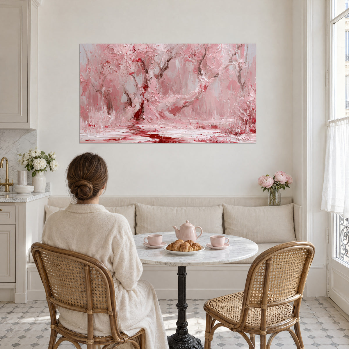 Wall art avenue of trees in soft pink and deep red with thick palette-knife strokes, above a round marble table