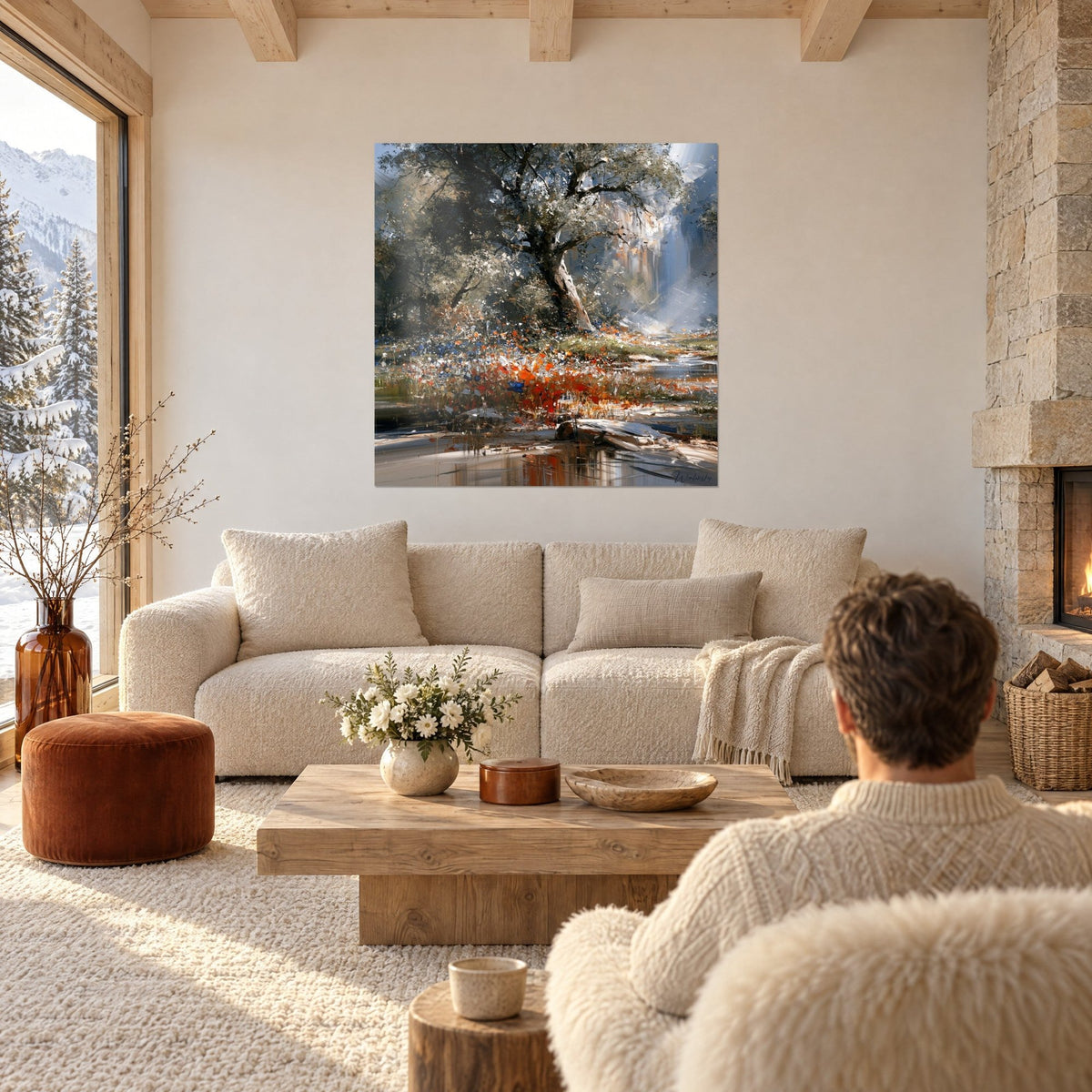 Quadro di quercia con fogliame argentato sopra papaveri arancioni e fiordalisi blu, sopra un divano in un soggiorno luminoso
