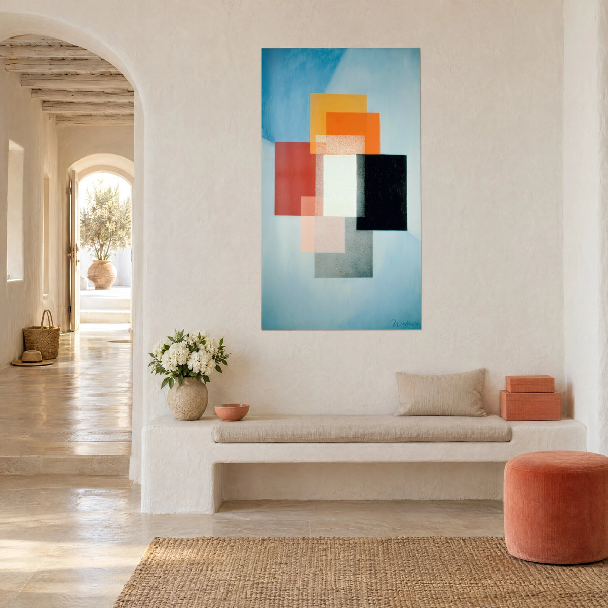 Wall art with a constructivist composition of translucent ochre and charcoal-black planes, three-quarter view, white banquette and arch