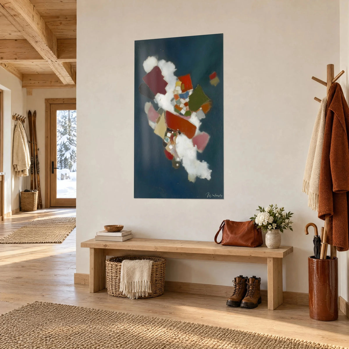Wall art scarlet polygons and cotton-white clouds floating on a navy blue background, hung near a wooden bench in a chalet entrance