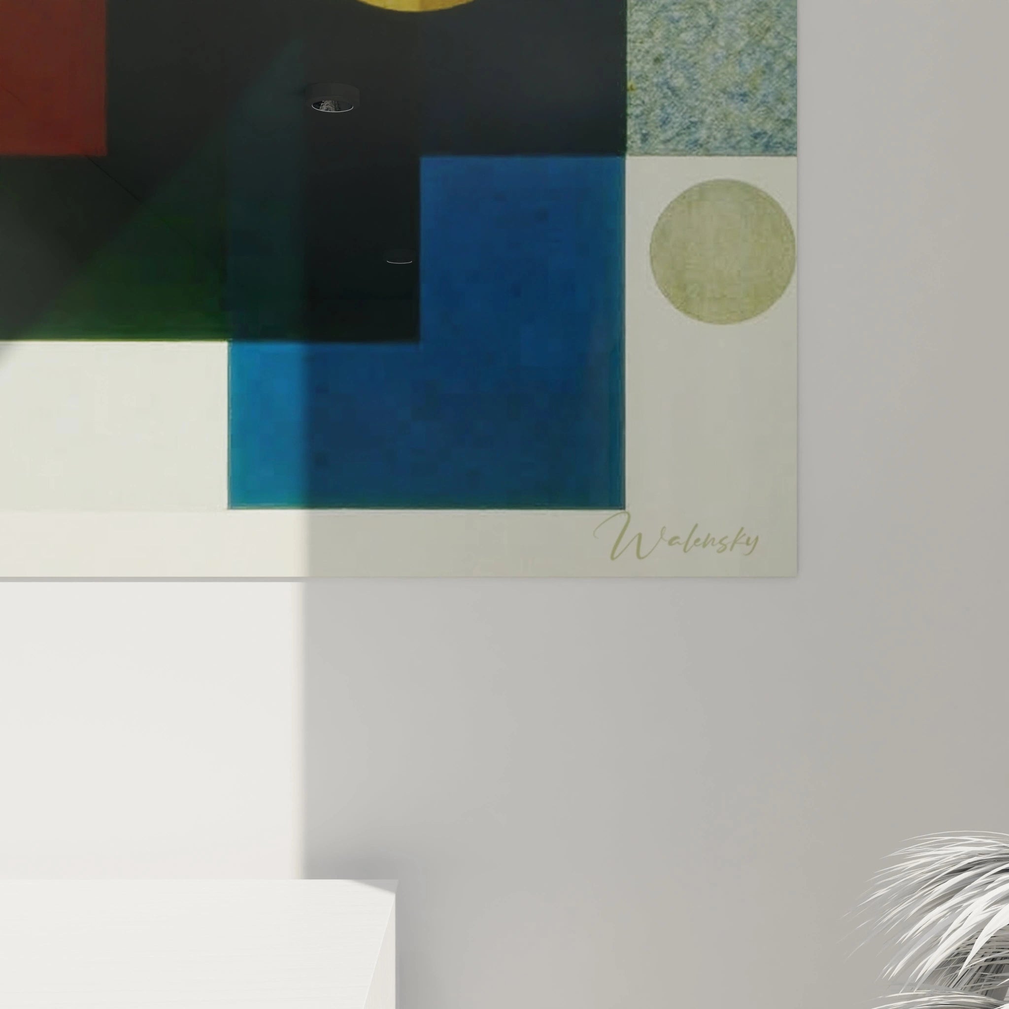 tableau formes géométriques design mural Walensky coin d affiche bleu et cercle vert au dessus d un meuble blanc