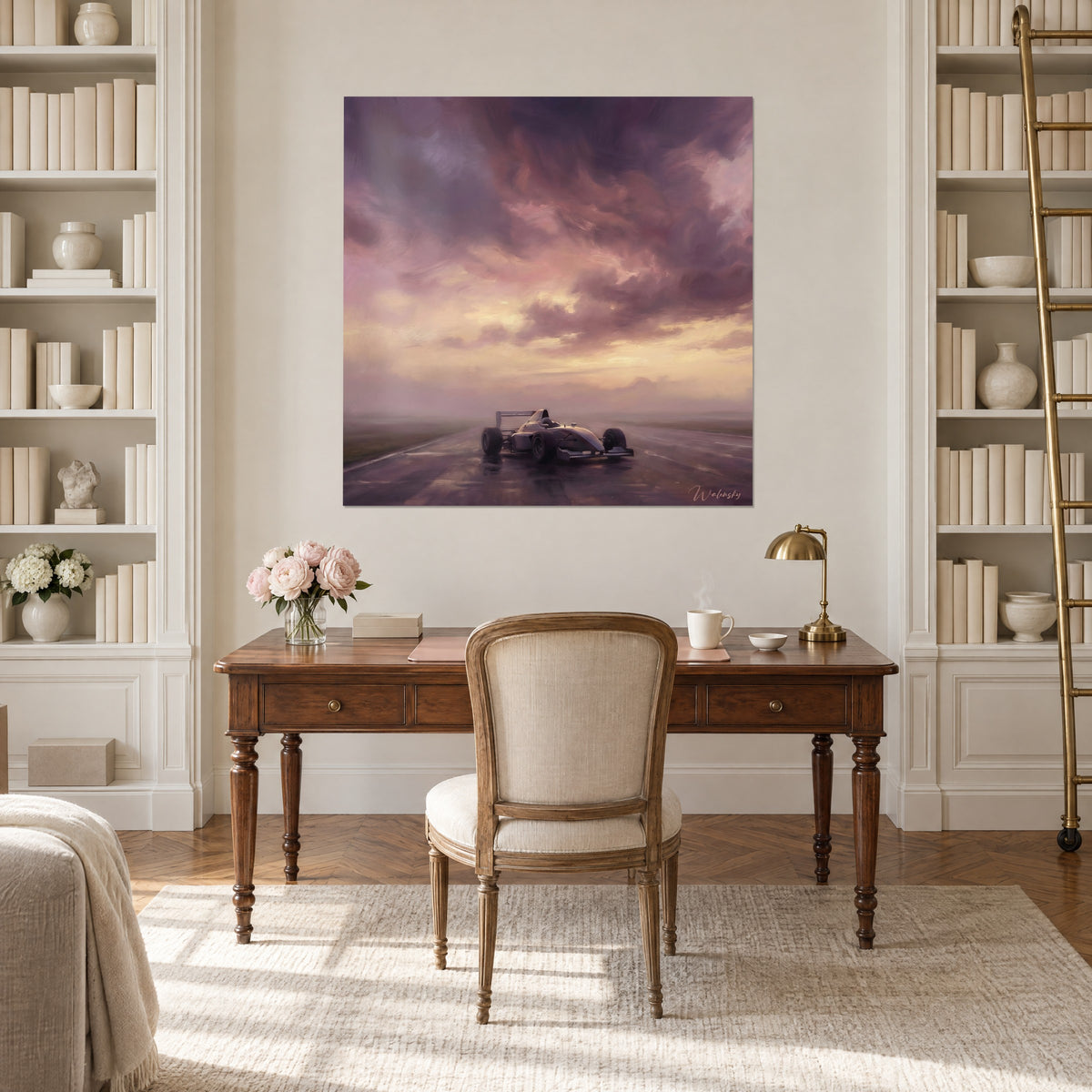 Wall art of a race car speeding into the mist, violet clouds and cream glow, hung between two bookshelves in an office