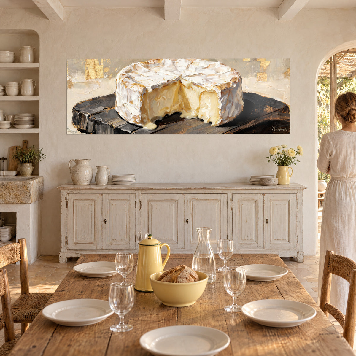 Wall art wheel of camembert with golden reflections, velvety paste oozing over dark wood, facing a woman seen from behind in a dining room