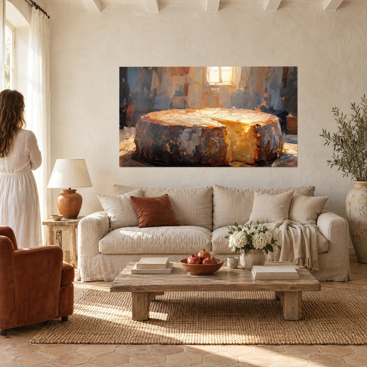 Wall art golden cheese wheel, brown and bluish rind, warm glow of light, above a sofa in a bright living room
