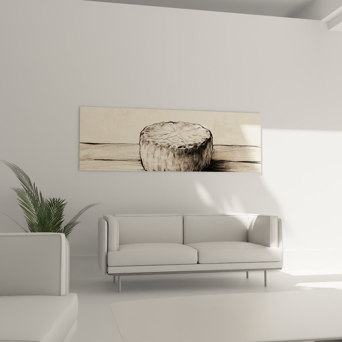 Meule ronde beige et grise, texture croûtée, au-dessus d'un canapé dans un salon lumineux