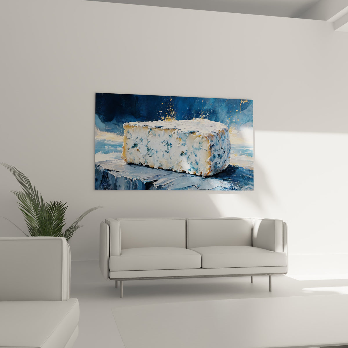 Pavé de fromage veiné anthracite et blanc rehaussé d'or, au-dessus d'un canapé dans un salon lumineux