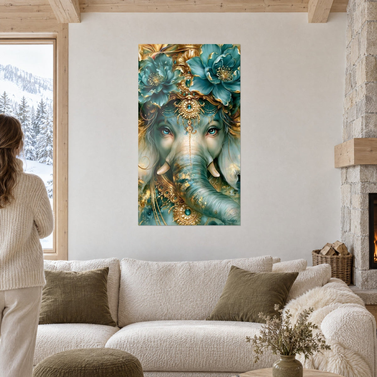 Wall art of an elephant with turquoise eyes, crowned with blue-green and gold peonies, above a sofa in a bright living room