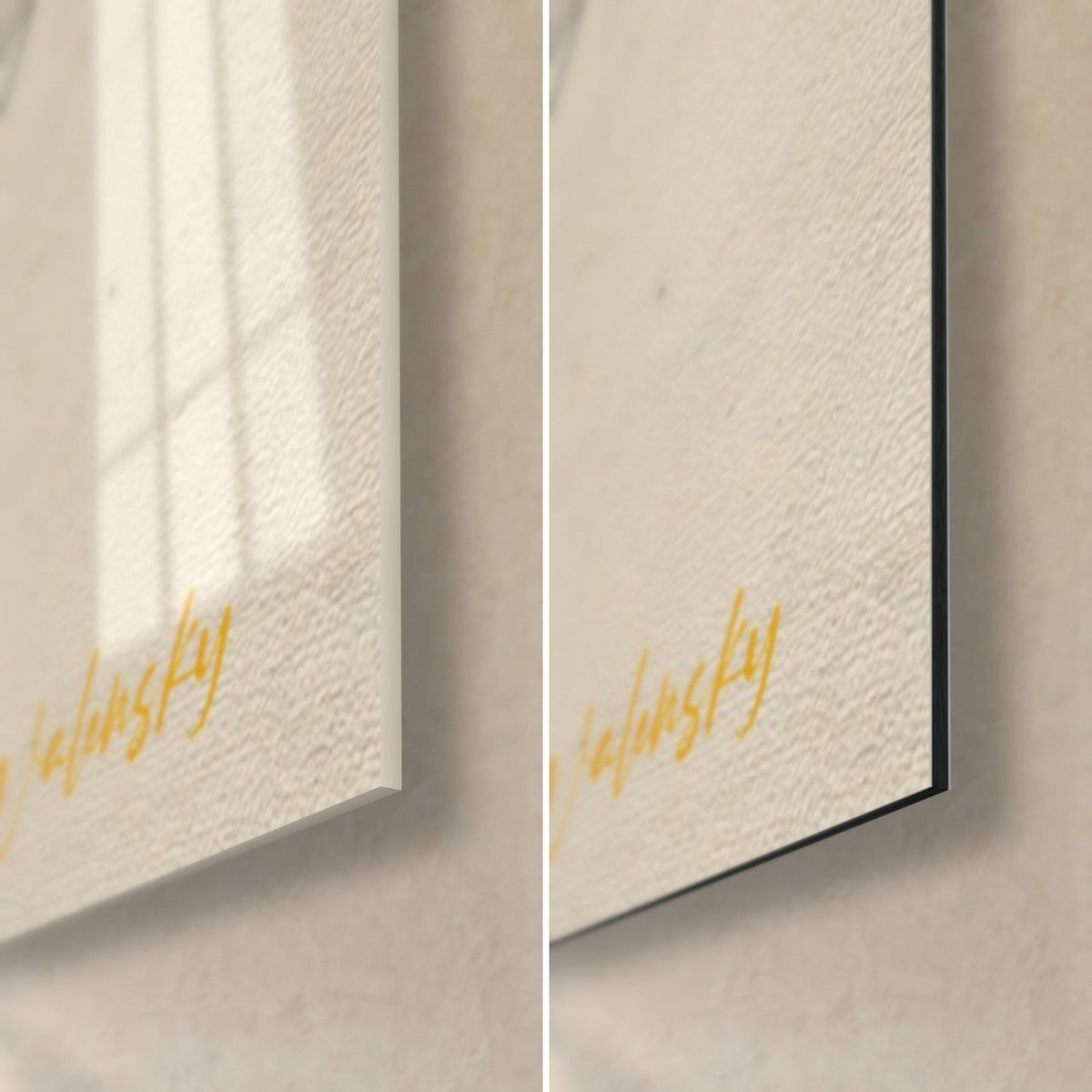 Wall art black elephant trunk on cream paper, bottom right corner: glossy acrylic glass on the left, matte black Dibond on the right