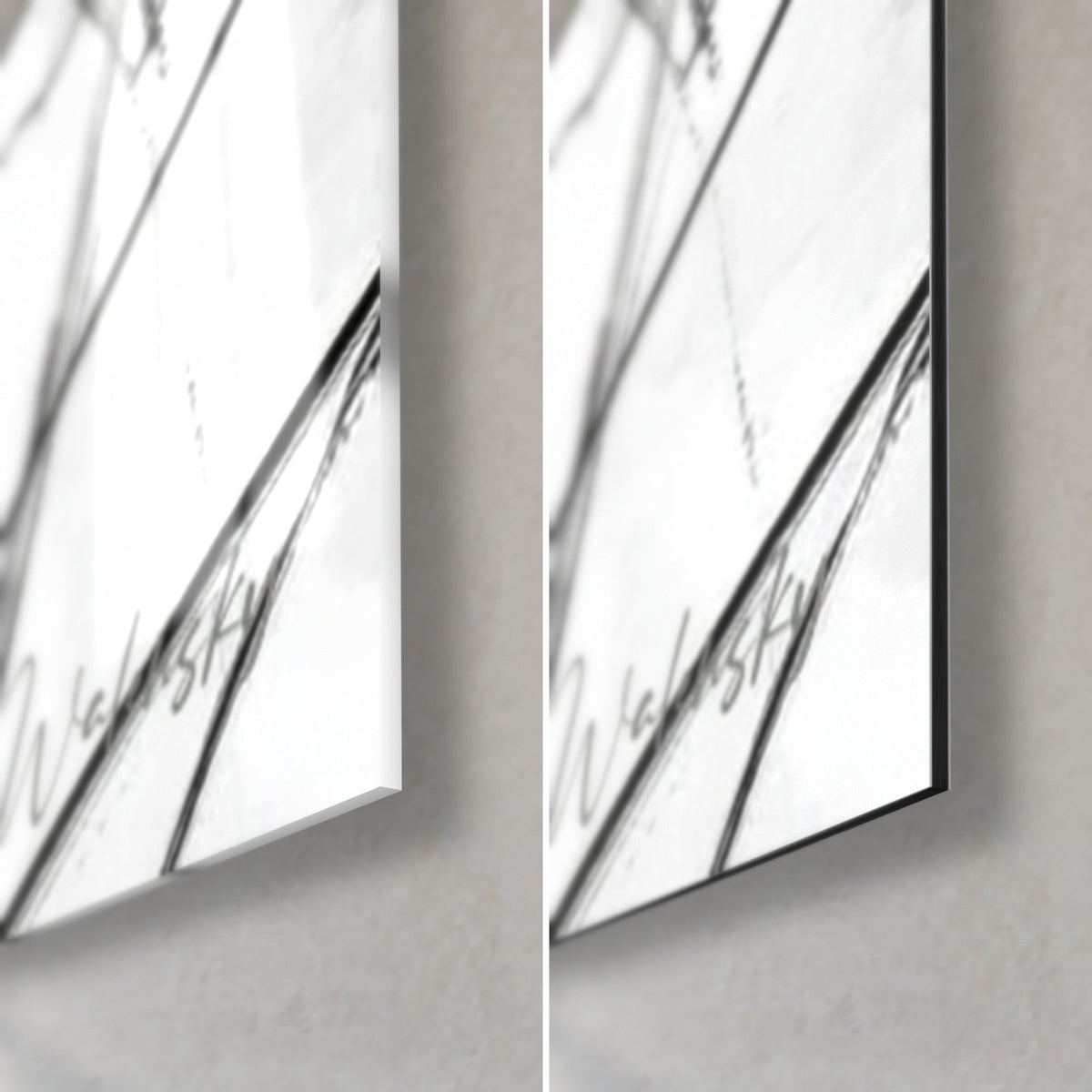 Wall art sacred elephant in black ink and white, bottom right corner: glossy acrylic glass on the left, matte Dibond on the right