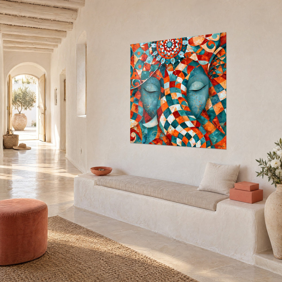 Wall art sacred elephant in meditation, turquoise and burnt orange diamonds, three-quarter view on a whitewashed wall beside a bench