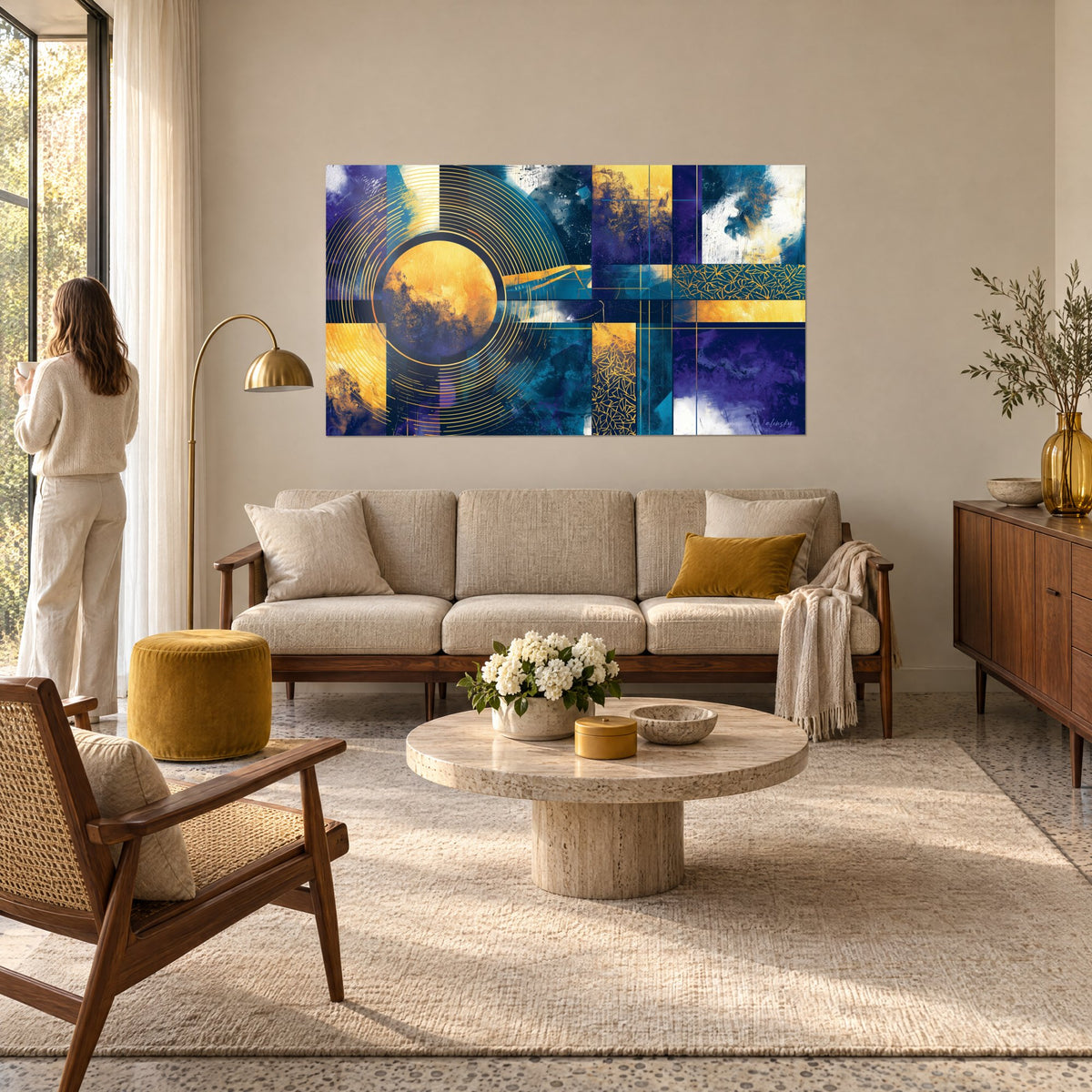 Wall art ochre sun disc ringed by golden circles, navy and violet background, above a sofa in a bright living room