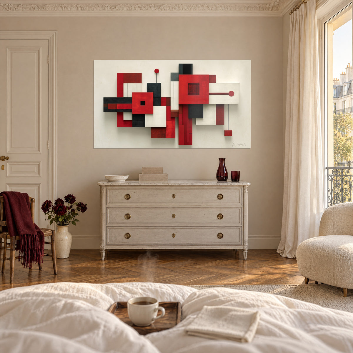 Quadro con un assemblaggio di quadrati rosso carminio, nero carbone e bianco sporco, asta con disco rosso, sopra un letto in una camera luminosa