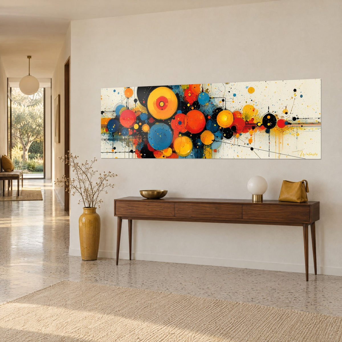 Wall art with an abstract composition of orange and vermilion red spheres on a cream background, black lines, above a wooden console