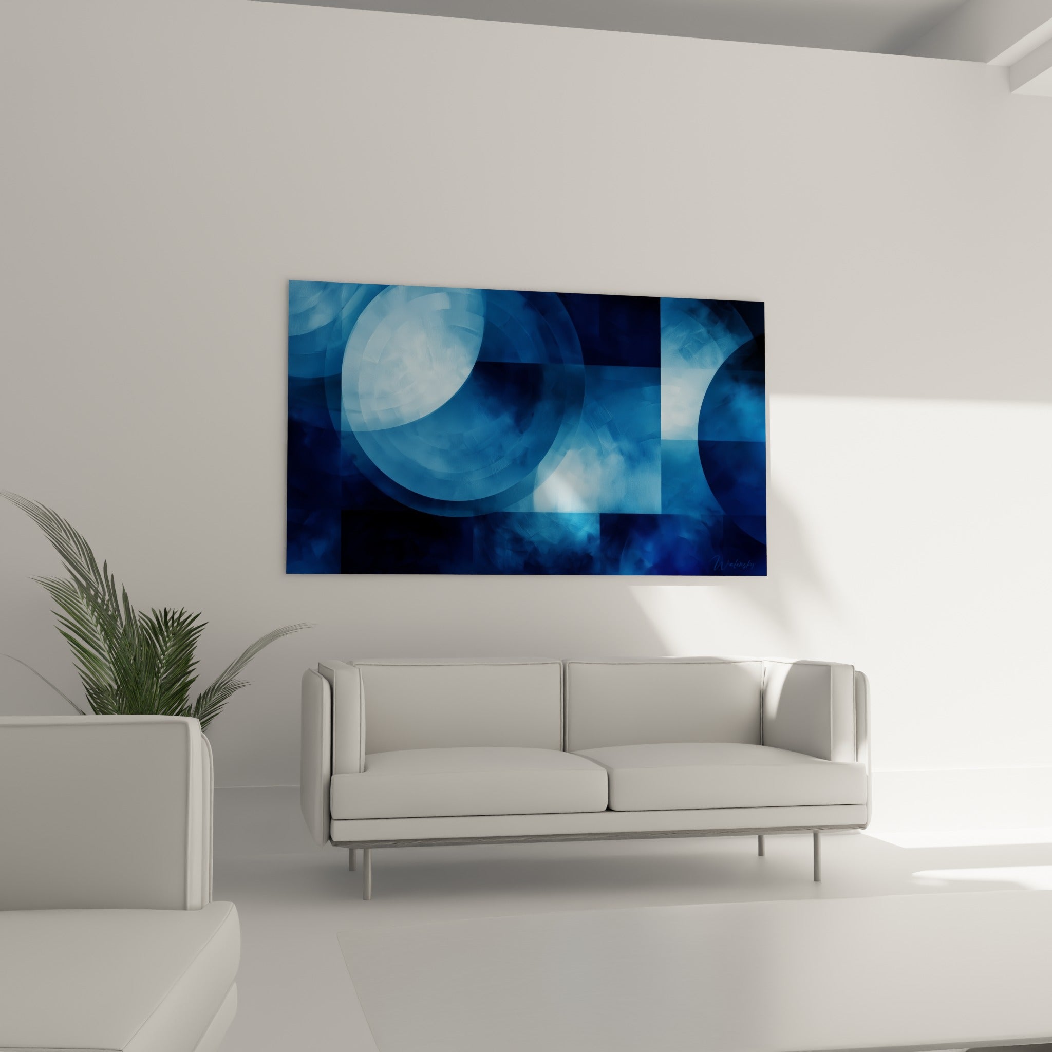 Motifs géométriques anthracite et bleu pastel au-dessus d'un canapé dans un salon lumineux