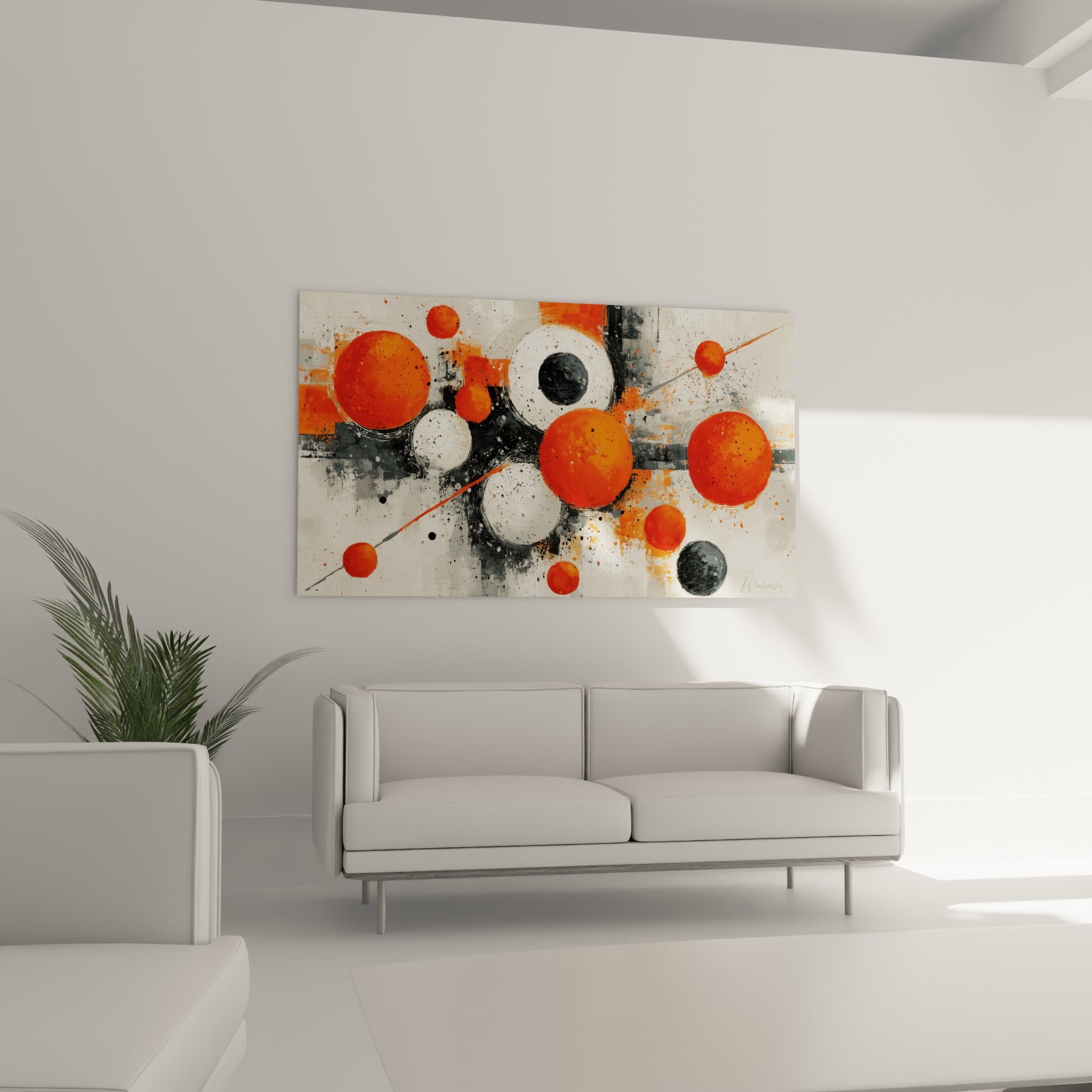 Formes rondes terracotta et noires structurent ce tableau géometrique abstrait au-dessus d'un canapé dans un salon lumineux