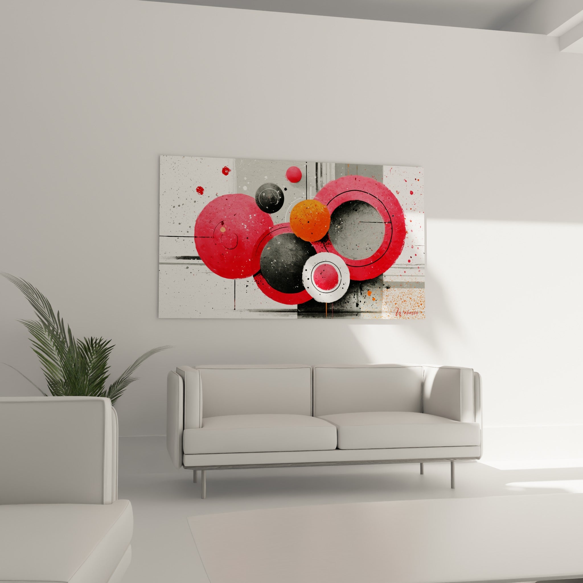 Formes rondes rouges, grises et orange de ce tableau géometrique abstrait au-dessus d'un canapé dans un salon lumineux