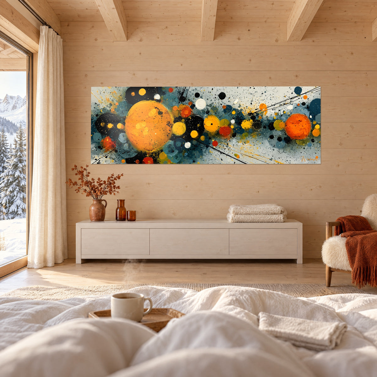 Tableau naissance stellaire aux cercles dorés, rouge brique et bleu pétrole, au-dessus d'un lit dans une chambre claire