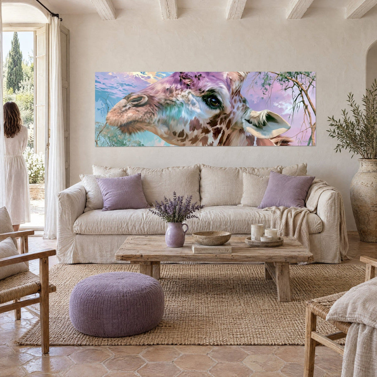 Wall art giraffe with powdered pink muzzle and dark eye, lilac and turquoise sky, above a sofa in a bright living room